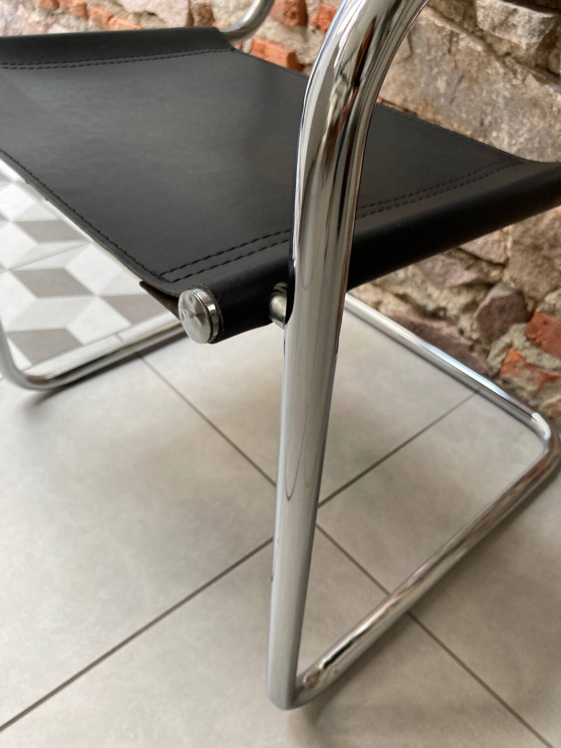 Chrome and black leather armchair type B34