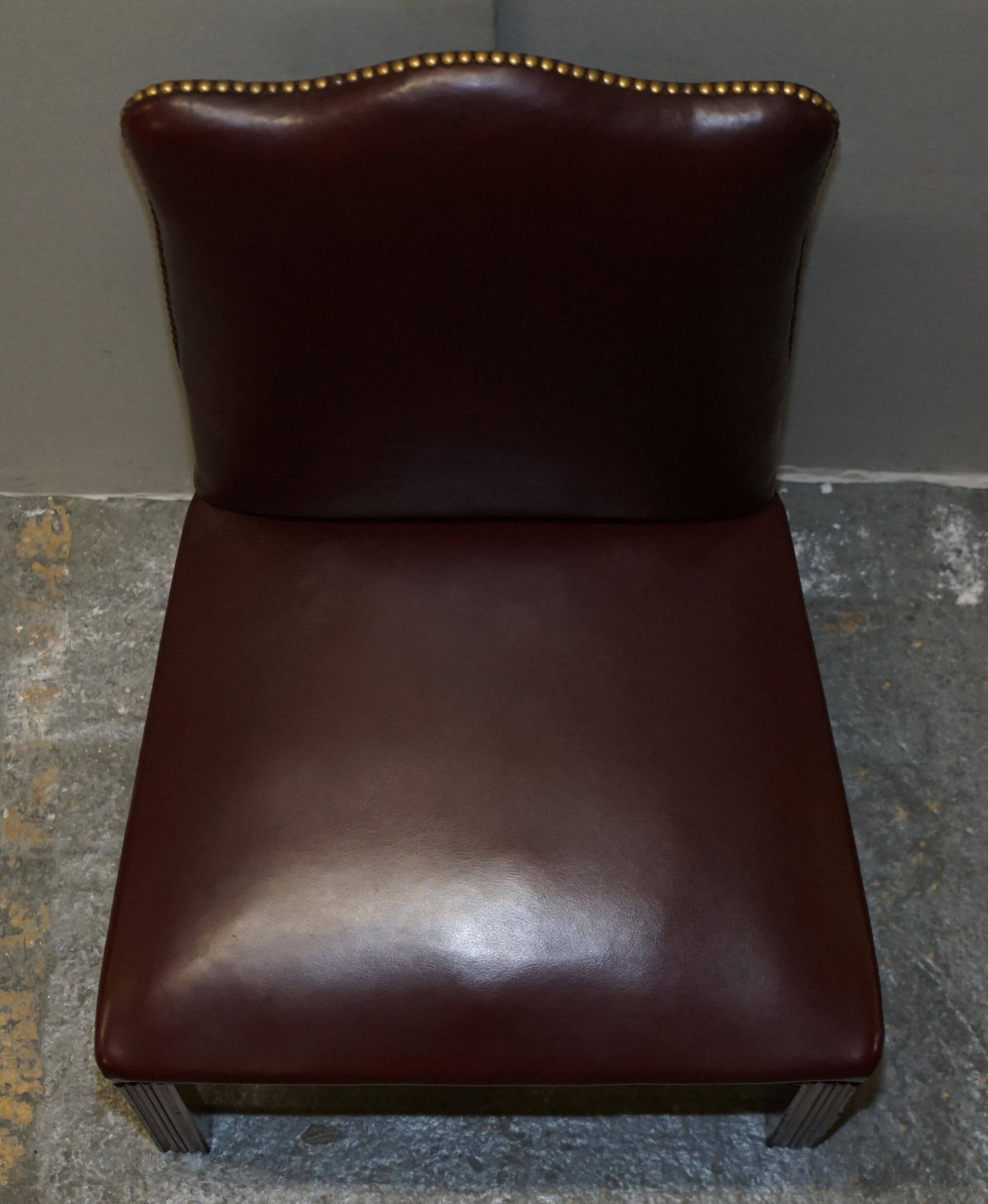 Pair of Spencer House leather office chairs