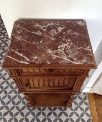 Old wooden bedside table and marble tray