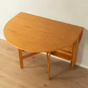 Practical folding table from the 1980s made of light brown pine wood