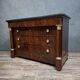 Empire commode in mahogany and flame mahogany veneer, 19th century.