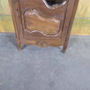 Small oak display cabinet with one door.