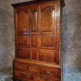 Antique English oak wardrobe with drawers, England, circa 1800–1820.