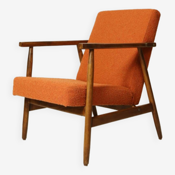 Modern wooden armchair orange bouclé fabric walnut wood colour 1970 s Scandinavian armchair Mid century modern design space age colour pumpkin orange bouclé