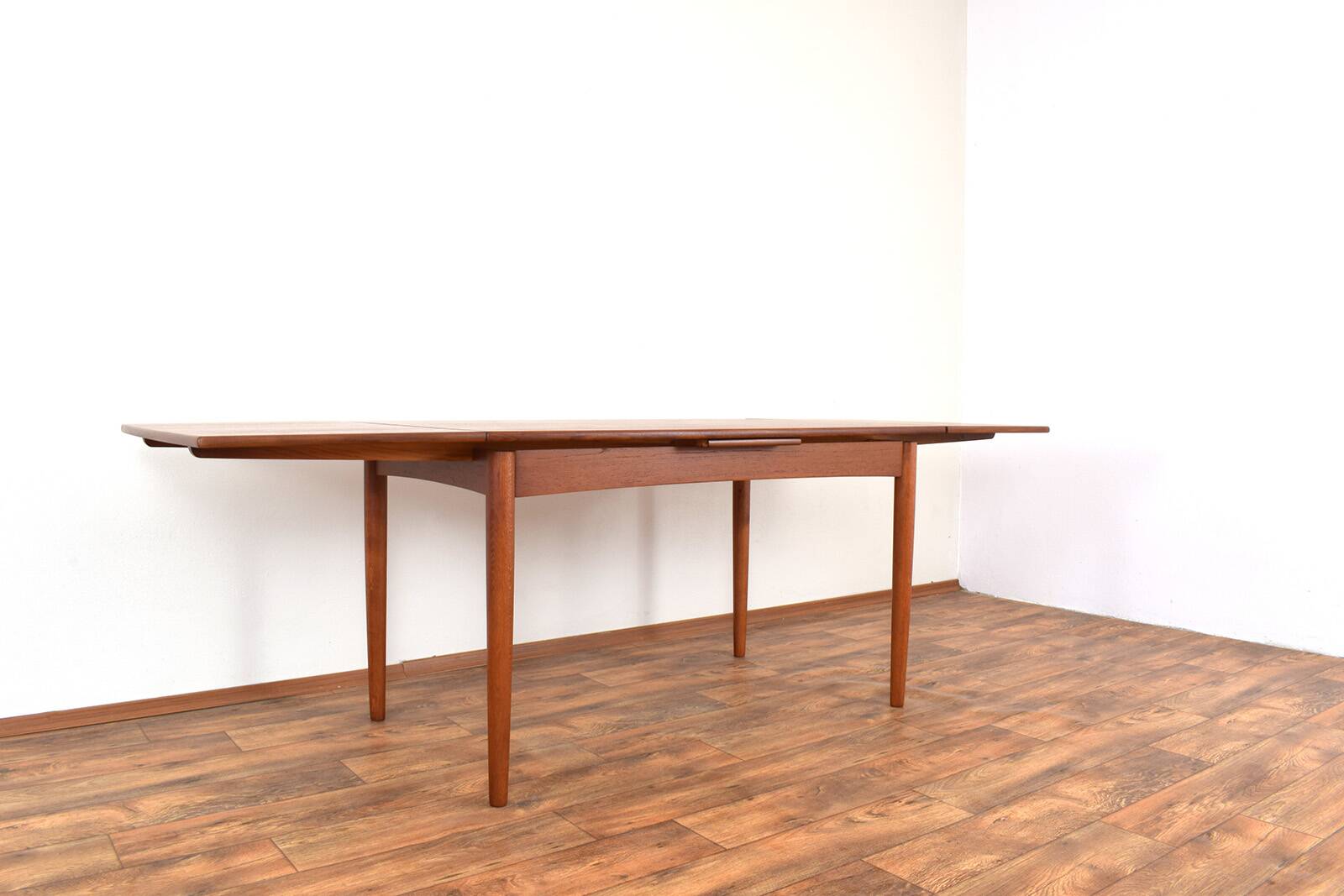 Mid-century Danish teak extendable dining table, 1960s.