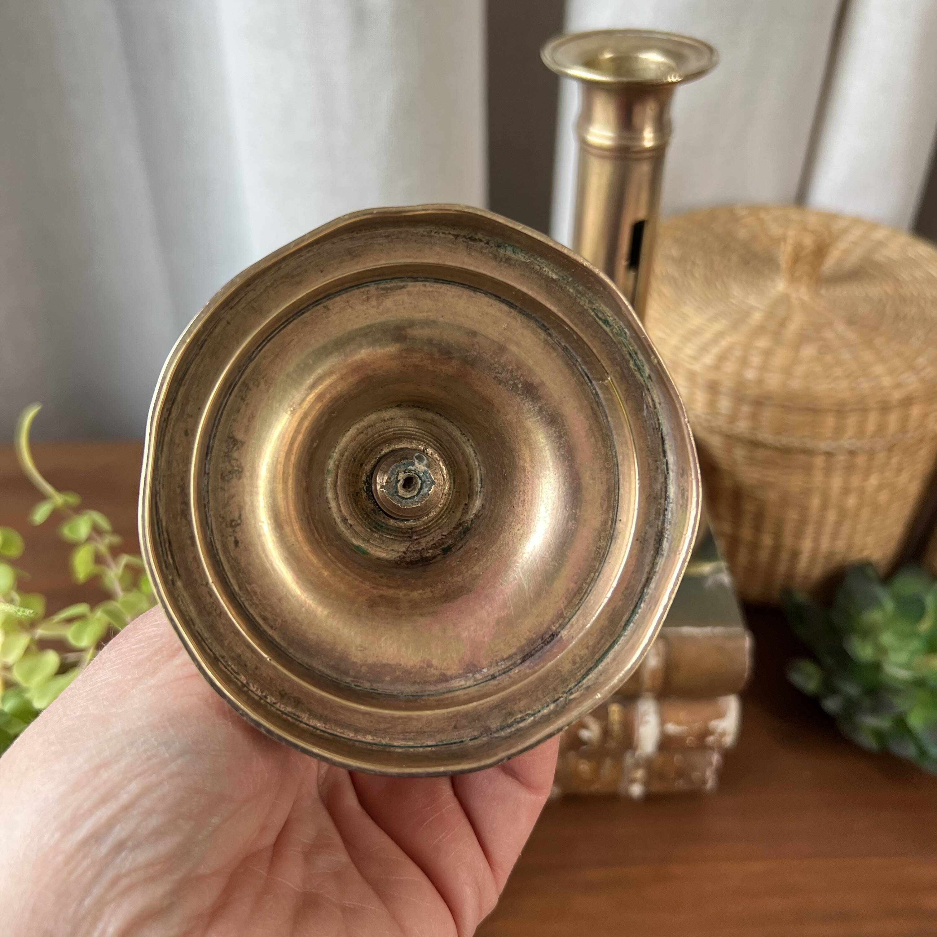 Duo of brass candlesticks