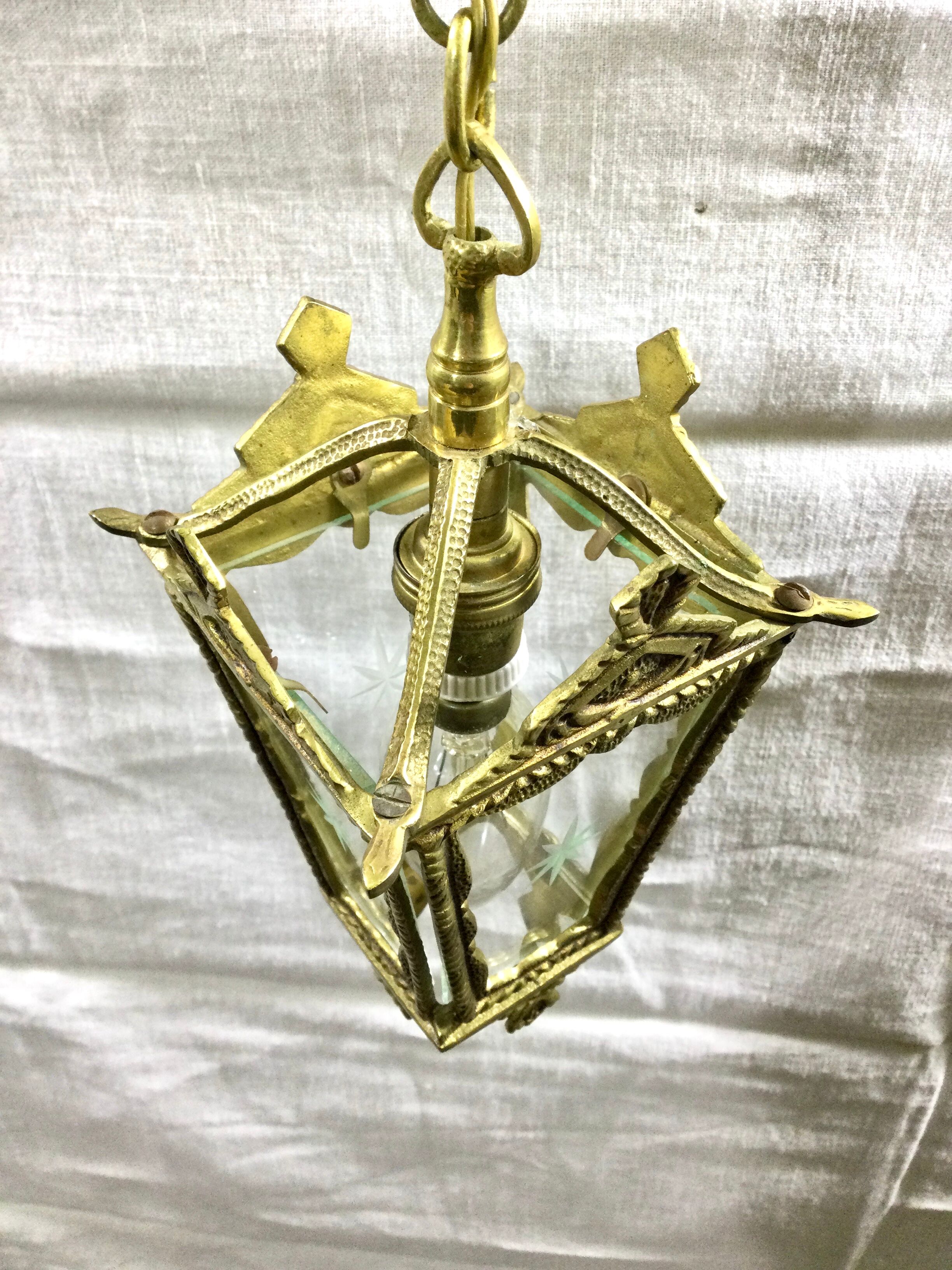 Bronze lantern with starry glasses