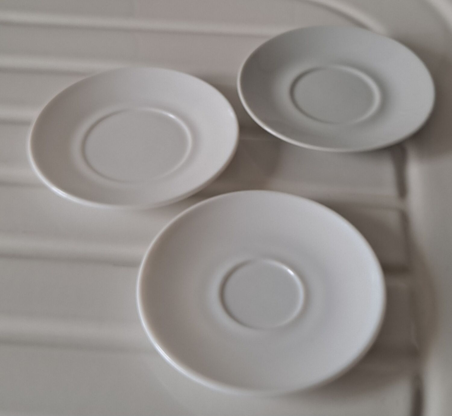 Trio of mismatched white cups