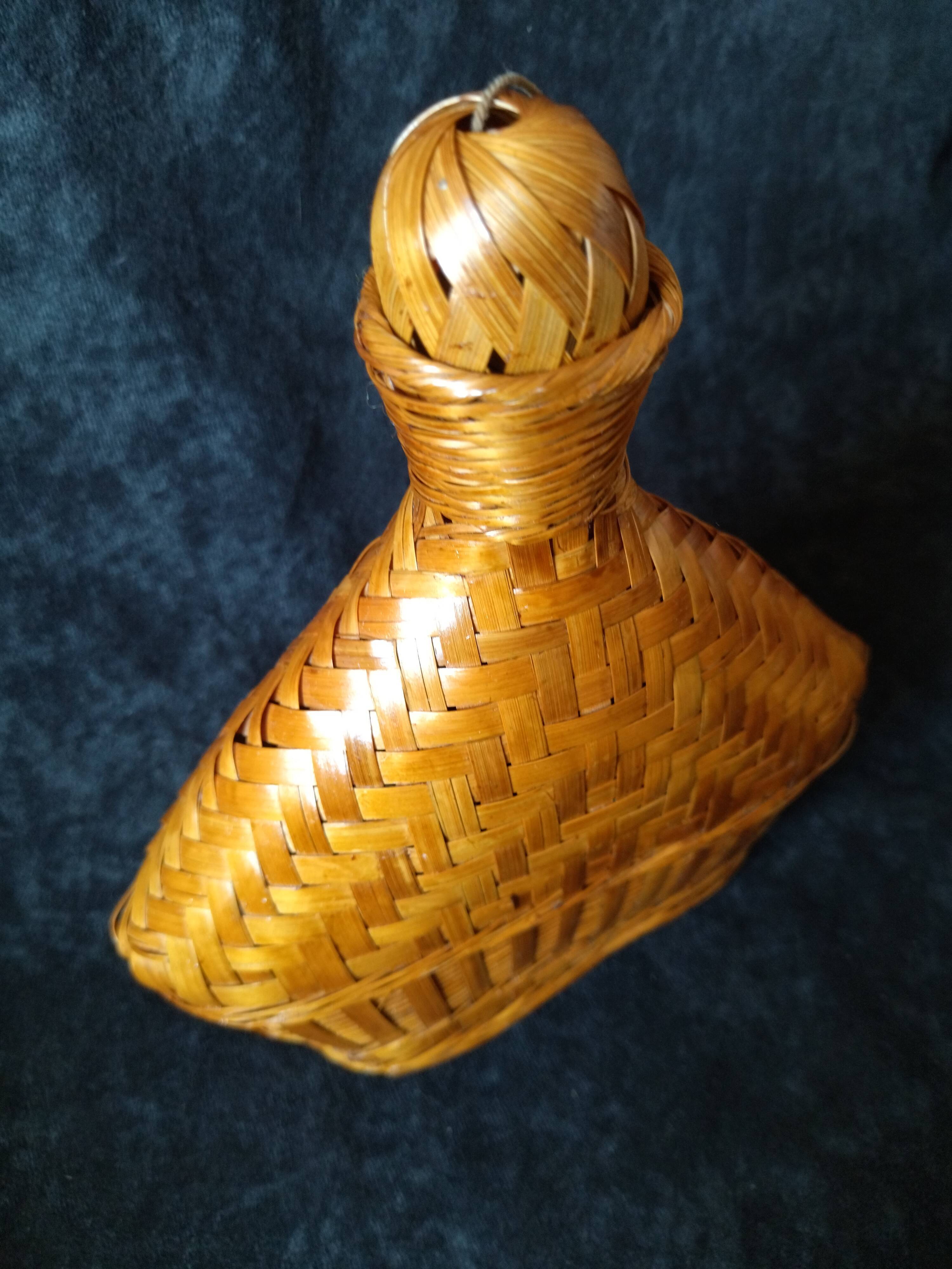 Vintage wicker and braided bamboo bottle