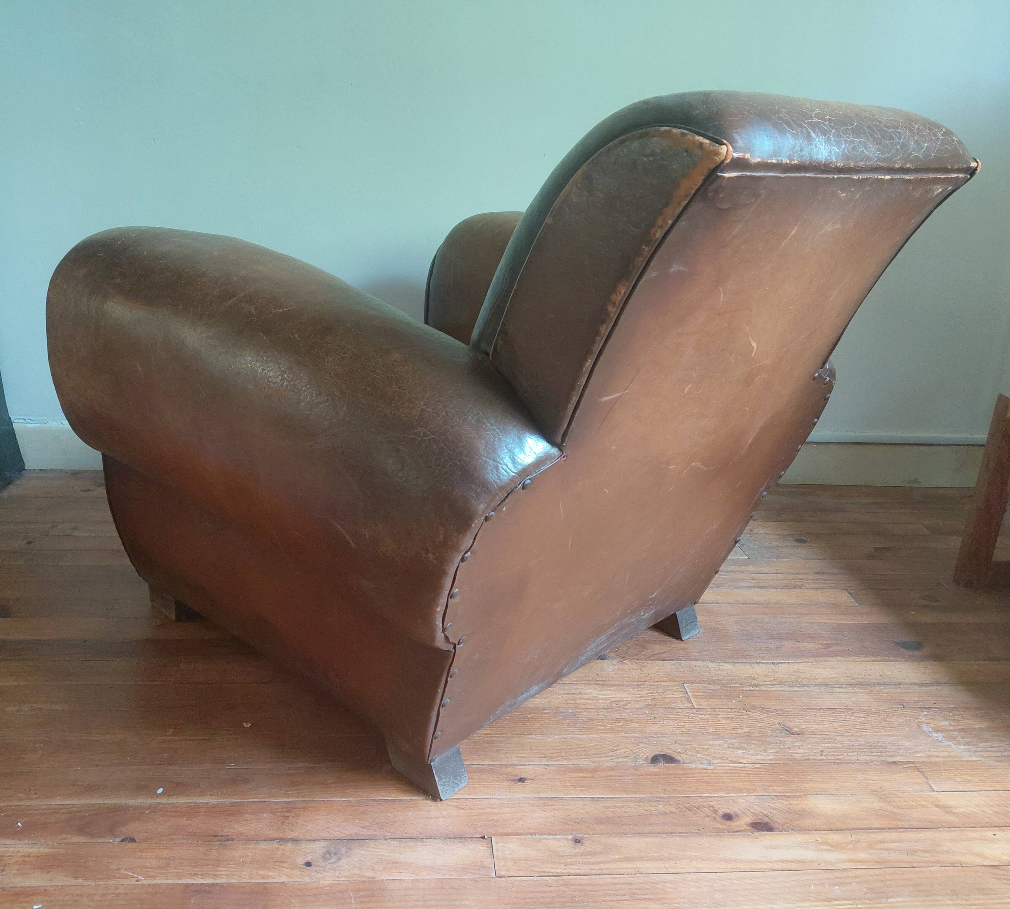 Club armchair, patinated leather