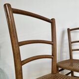 Pair of caned bistro chairs
