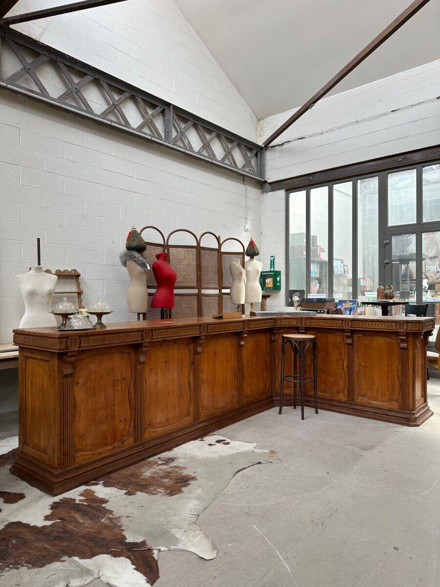 Large corner bar counter from the late 19th century.