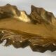 Vintage solid bronze leaf pocket emptier