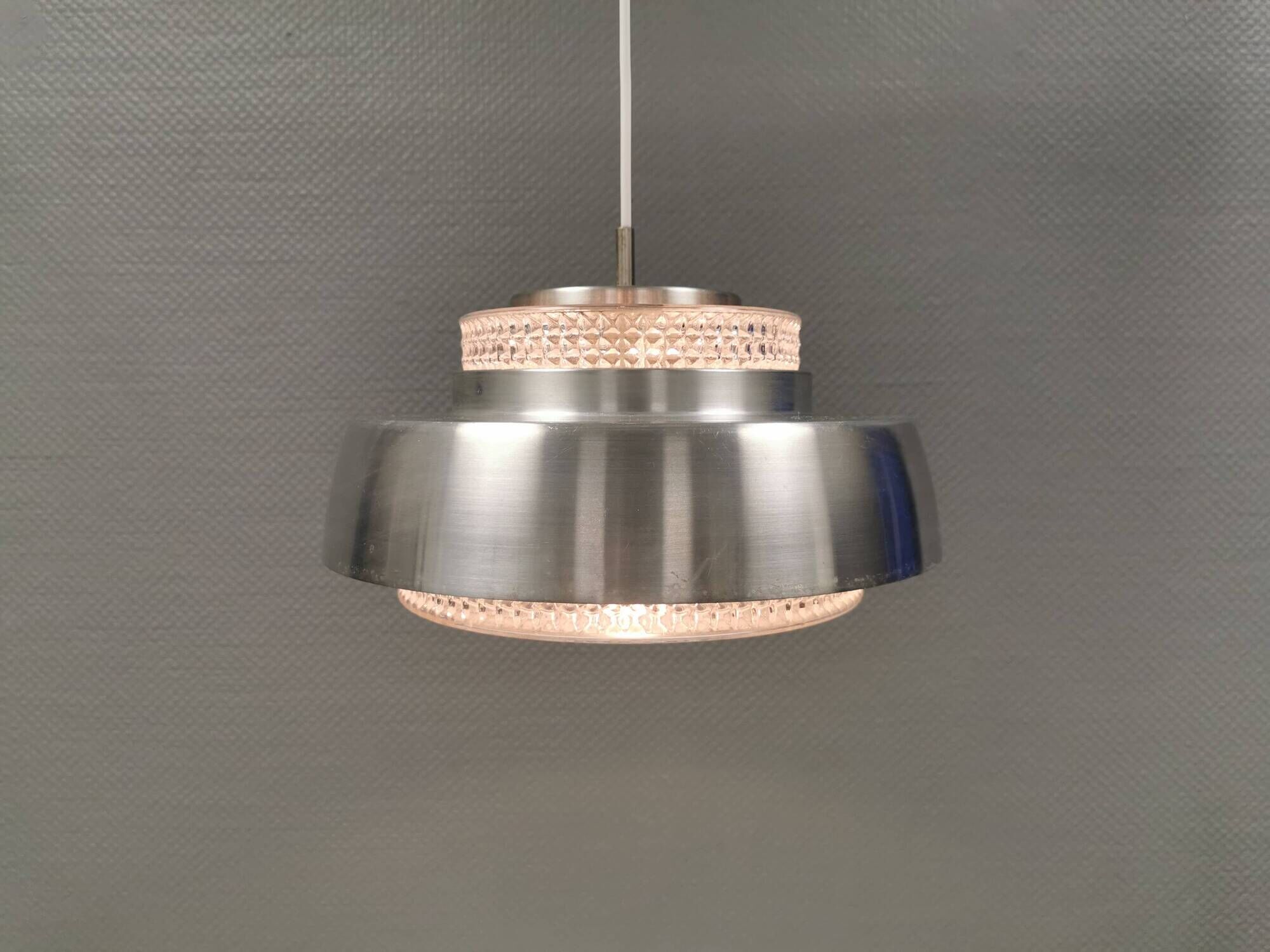 Hanging lamp in aluminium and hard pressed crystal glass. Denmark 1980s