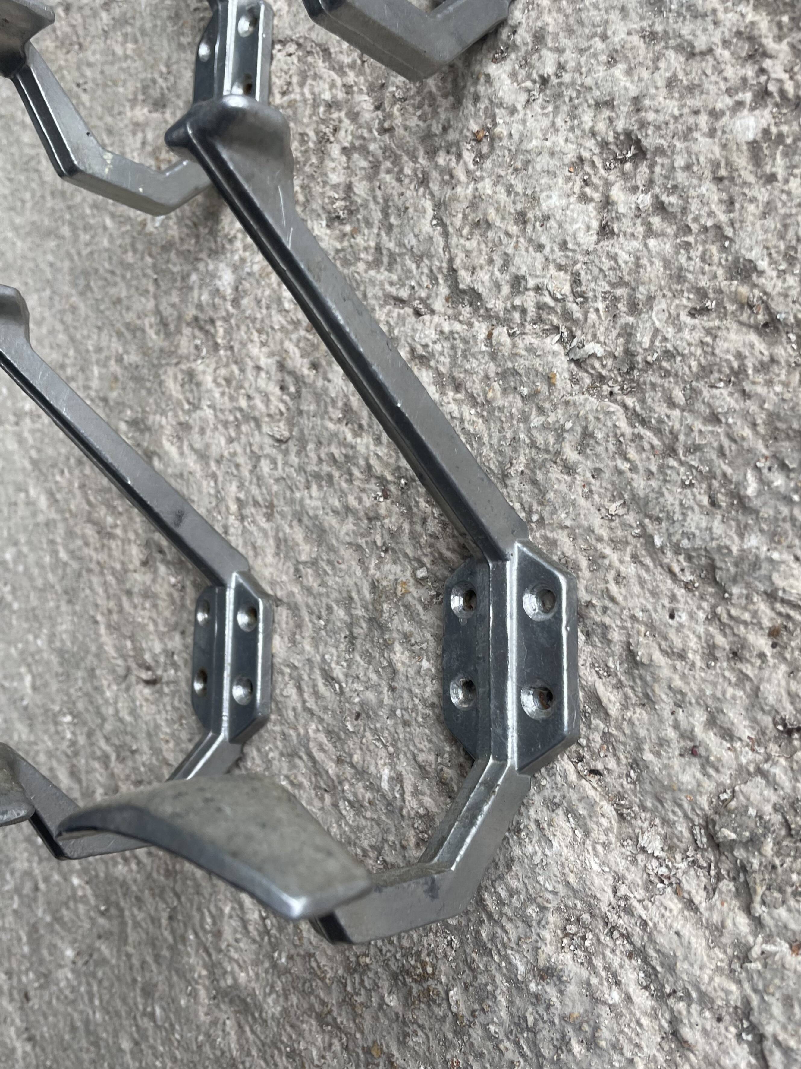 Set of 4 old metal coat hooks