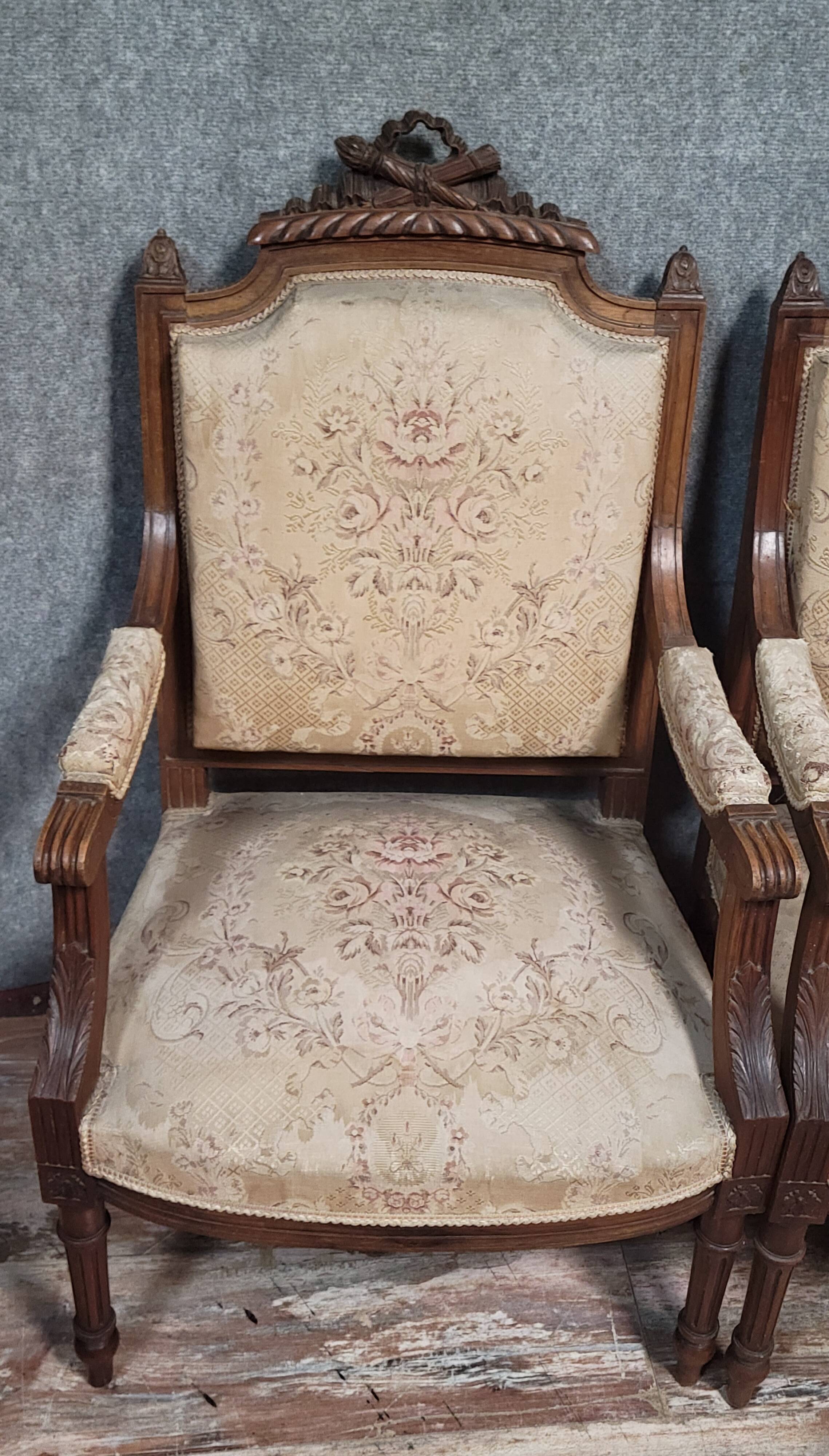 Pair of finely carved armchairs in the Louis XVI style