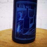 Surreal blue glass bottle, designed by Salvador Dali