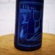 Surreal blue glass bottle, designed by Salvador Dali