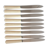 12 knives in white Bakelite, 1960