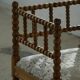 Antique French corner chair handcrafted with lamb's wool, early 20th century.
