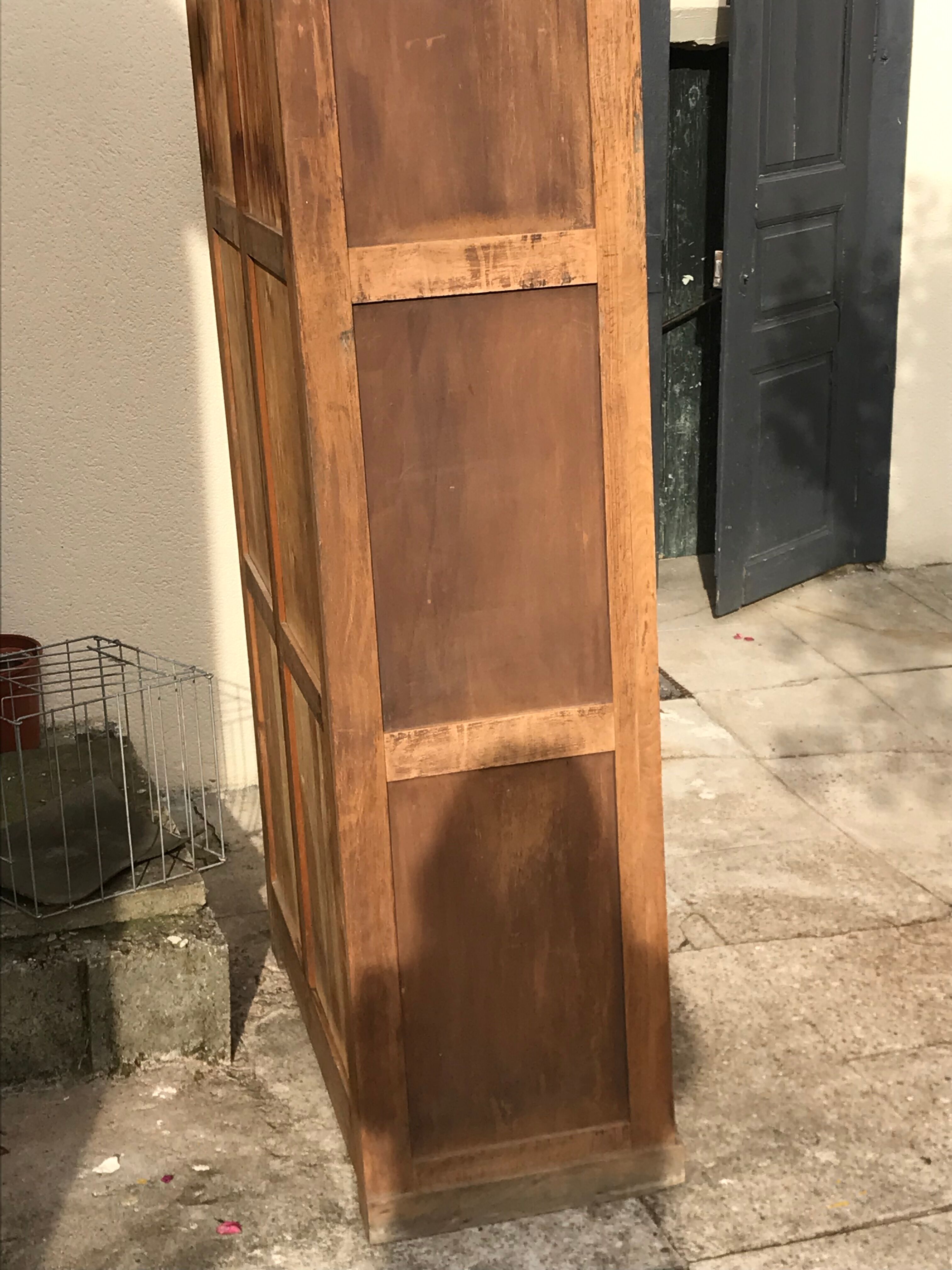 Parisian cabinet with double doors in raw wood