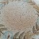 Speckled stoneware plate with floral decoration