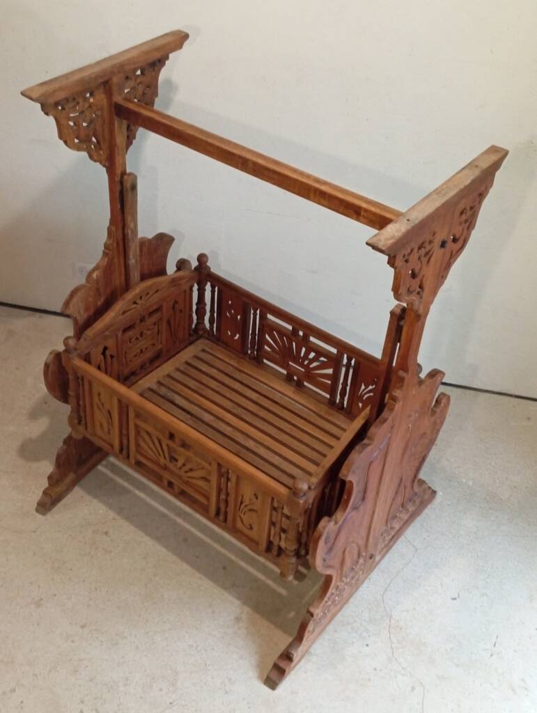 Solid teak carved swing cradle