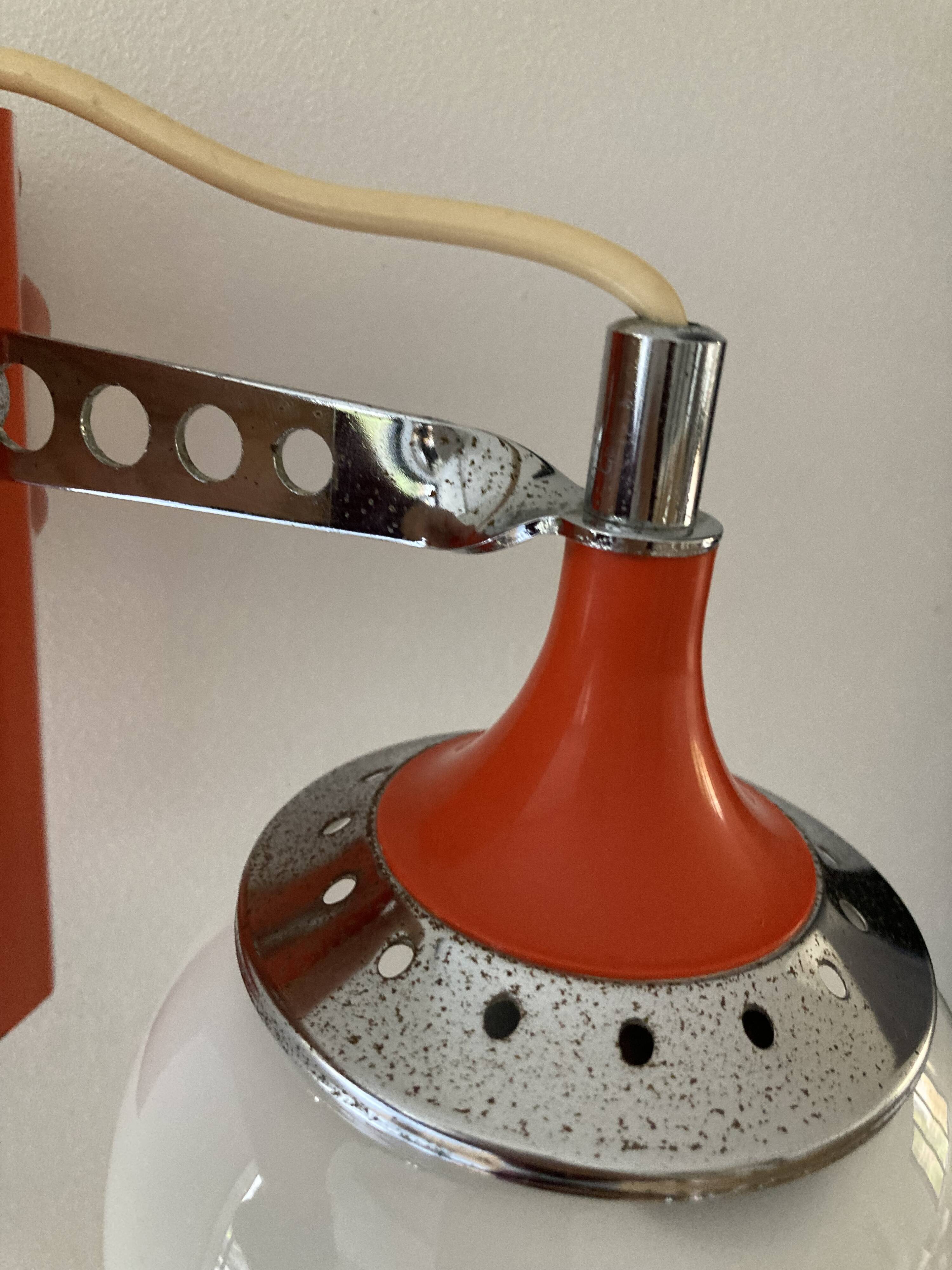 Set of two vintage orange wall lights from the 70s