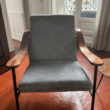 Armchair with walnut armrest