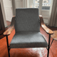 Armchair with walnut armrest