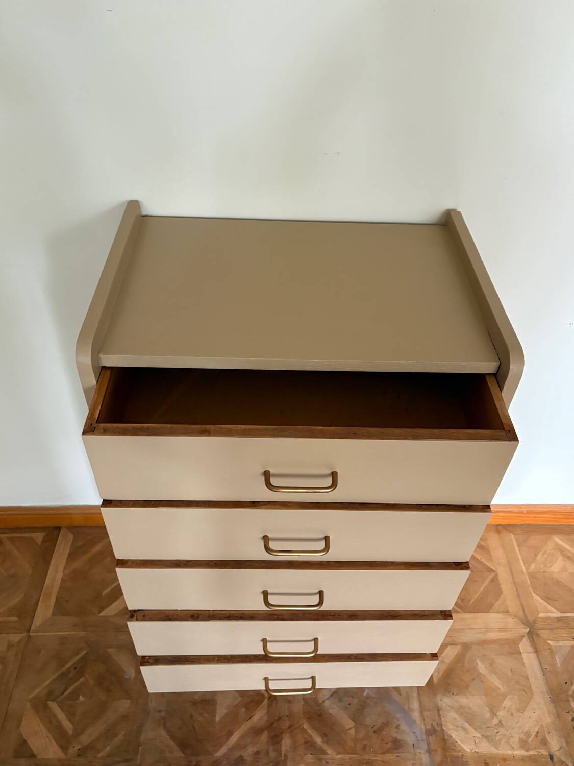 Mocha compass foot chest of drawers