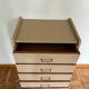 Mocha compass foot chest of drawers