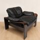 Paire de fauteuils scandinaves en cuir et palissandre