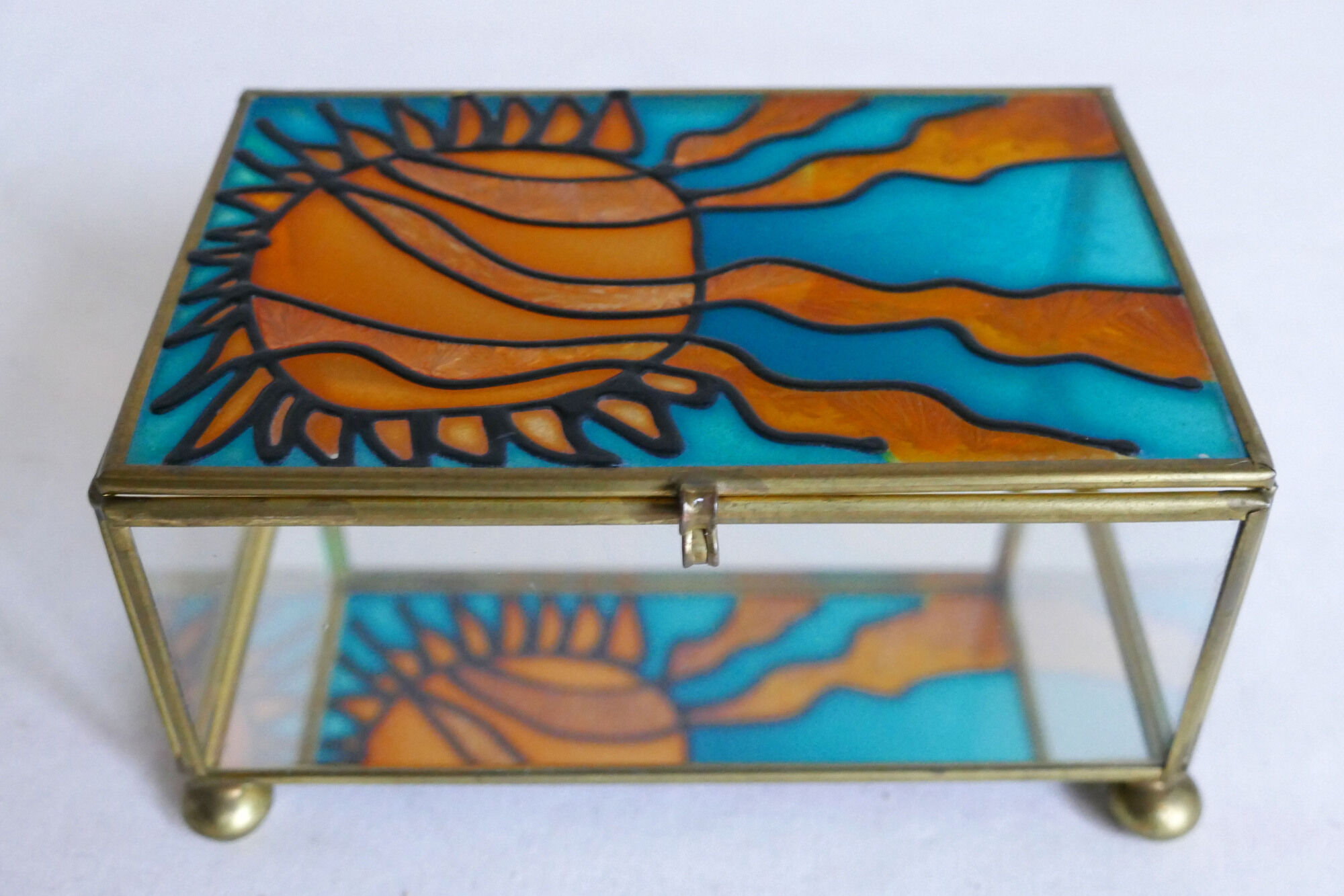 Blue and orange vintage jewellery box in 70s bohemian chic stained glass
