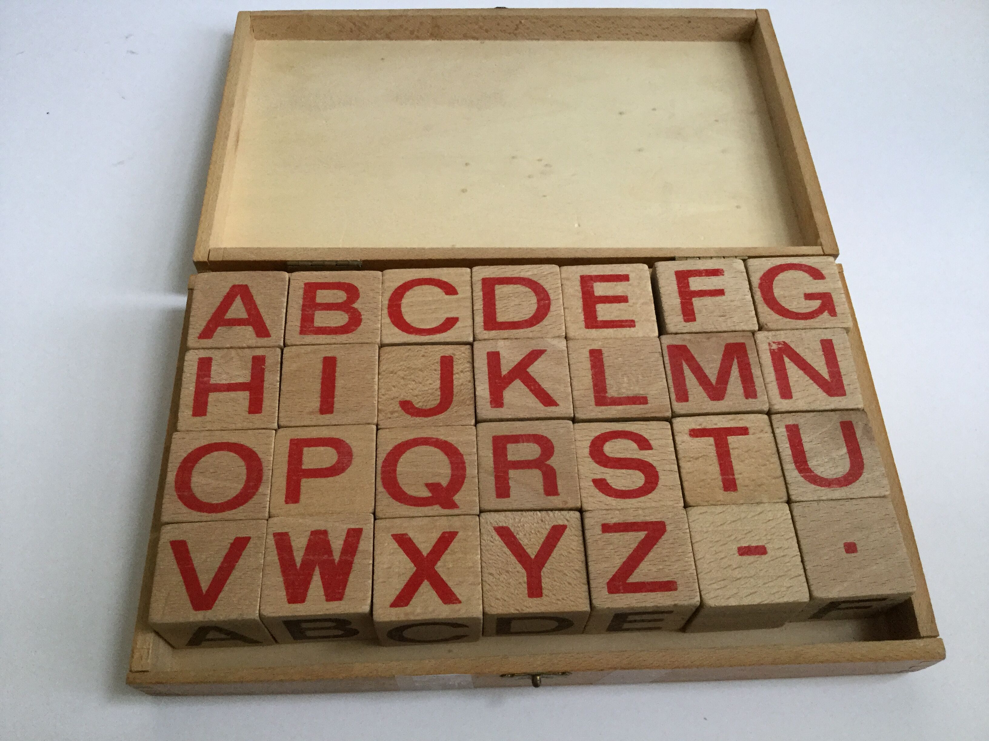 Ancient wooden toy cubes alphabet, figures and pictures