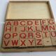 Ancient wooden toy cubes alphabet, figures and pictures