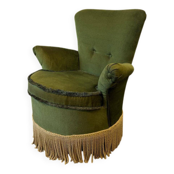Vintage moss green cocktail chair with fringes.