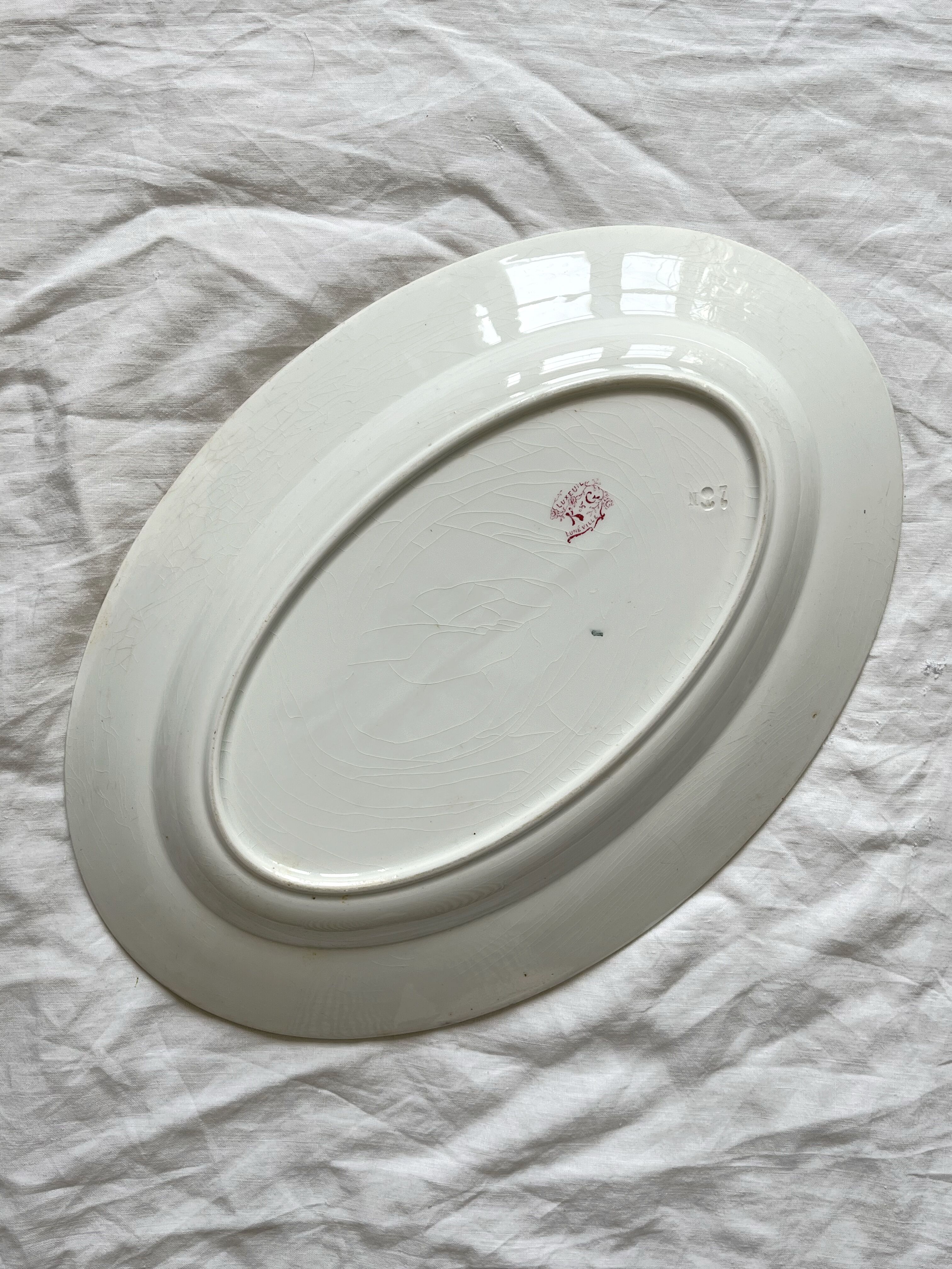 Oval plate in iron earth Luxeuil, KG Lunéville circa 1900