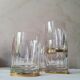 4 crystal whiskey glasses on gold frame