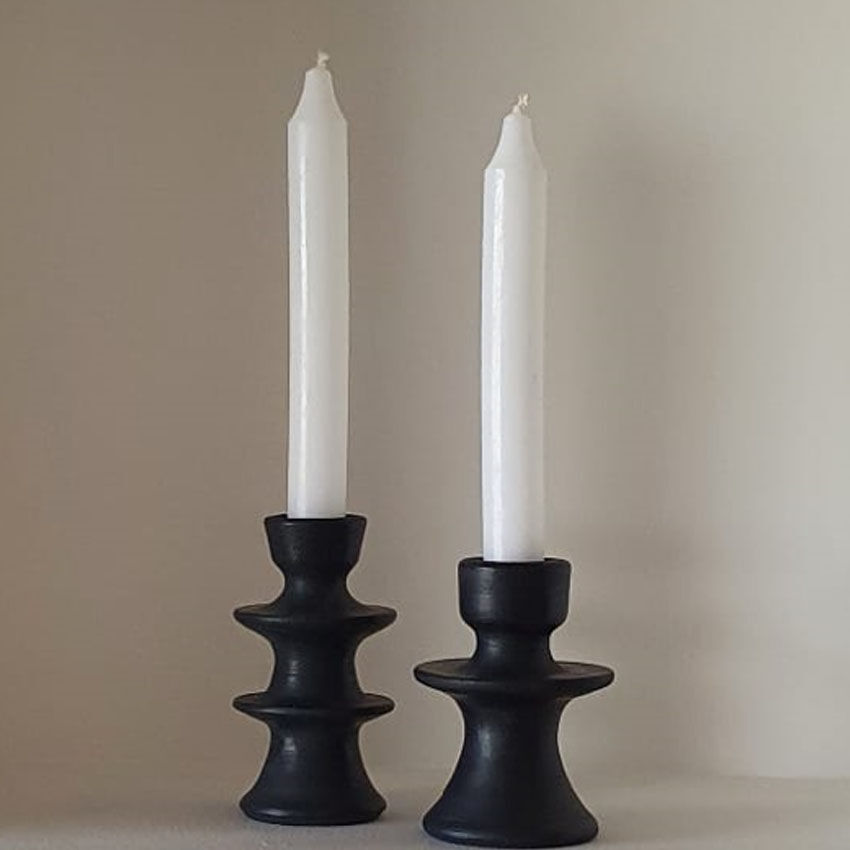 Set of two candlesticks in black tadelakt