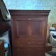 Secretary desk with mahogany and flame veneer.