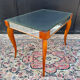 Small wooden coffee table with a mirror from the 1950s.
