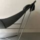 Design armchair Semana in black leather and steel by D. Weeks, limited edition 1980.