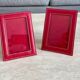 Pair of vintage red photo holder frames