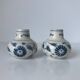Pair of miniature blue and white Vietnamese ceramic vases with floral decoration.