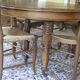 Table Louis Philippe et 4 chaises paillées noyer