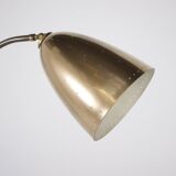 Modernist Paavo Tynell style floor lamp.