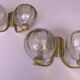 Mid century pair of brass and glass double wall lights, 1970s