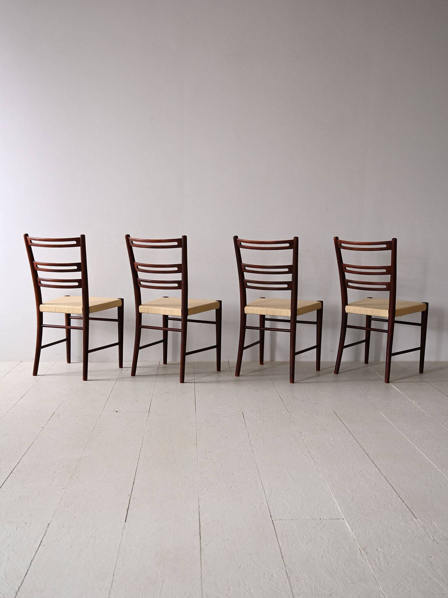 Scandinavian chairs in wood and leather