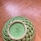 Green woven ceramic basket